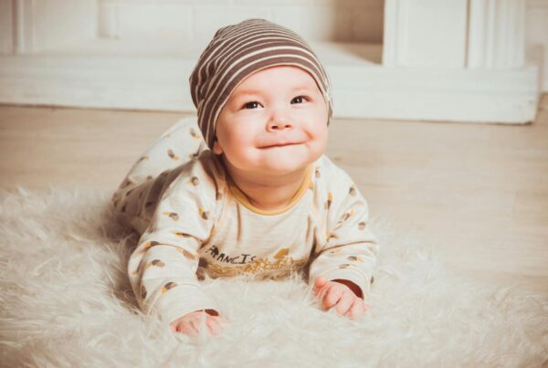 Baby On Fur Rug